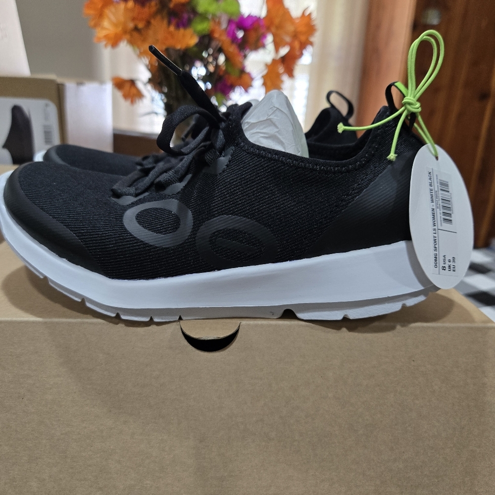 OOFOS Black and White Sneakers